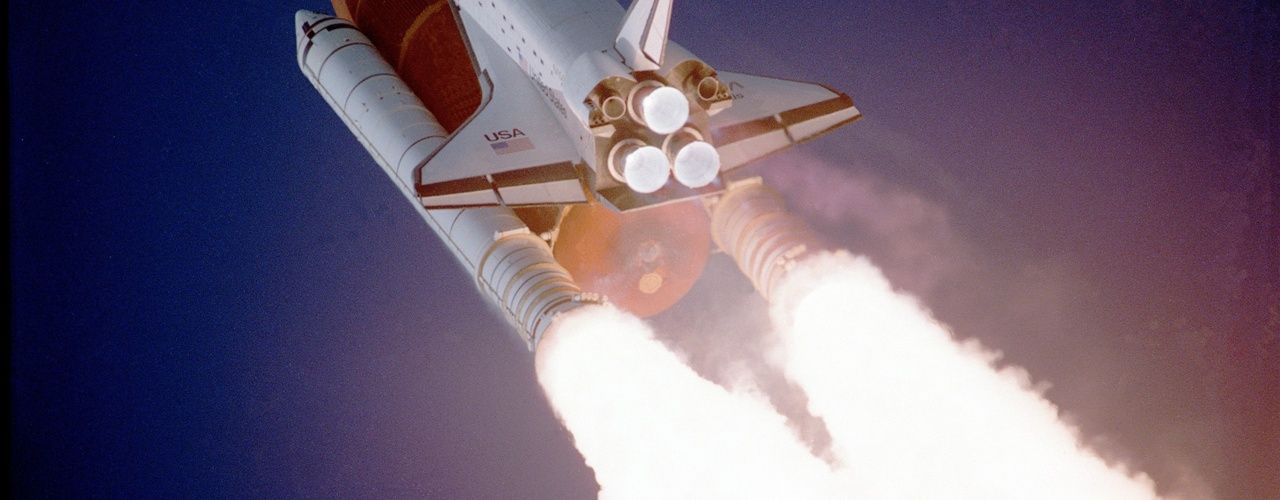 A rocket with the space shuttle