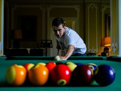 Dmitri Pisarev playing pool Dmitri Pisarev playing pool