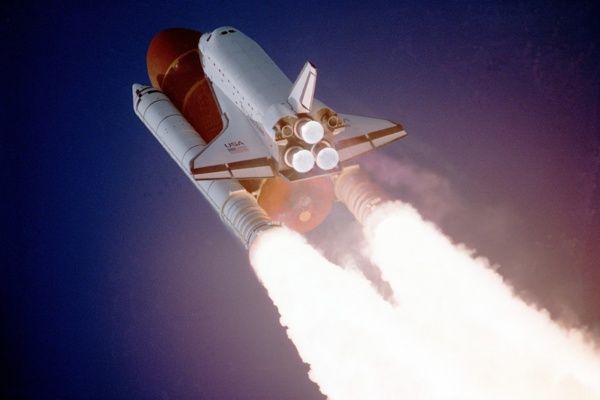 A rocket with the space shuttle
